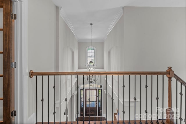 805 Hidden Pond Ln, Waxhaw, NC 28173 - stairs featuring a chandelier and crown molding