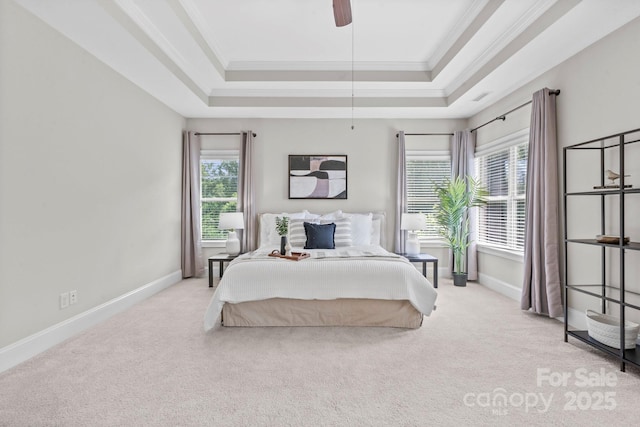 805 Hidden Pond Ln, Waxhaw, NC 28173 - bedroom with a tray ceiling, carpet floors, ornamental molding, and a ceiling fan