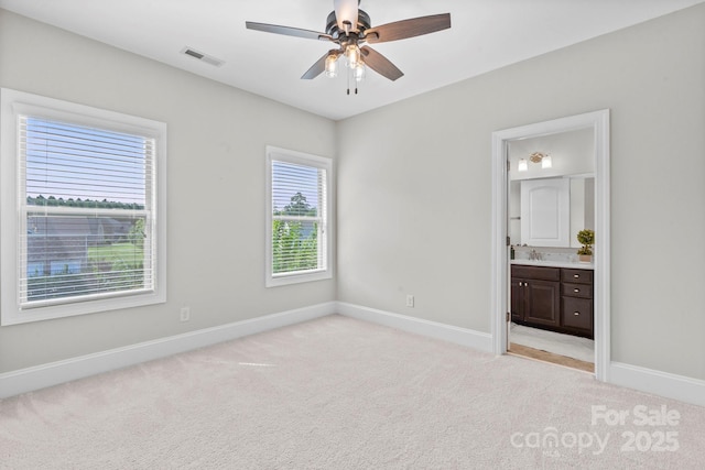 805 Hidden Pond Ln, Waxhaw, NC 28173 - unfurnished bedroom with light colored carpet, ensuite bathroom, and ceiling fan