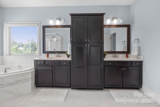 805 Hidden Pond Ln, Waxhaw, NC 28173 - full bath with a stall shower, double vanity, a garden tub, and marble finish flooring