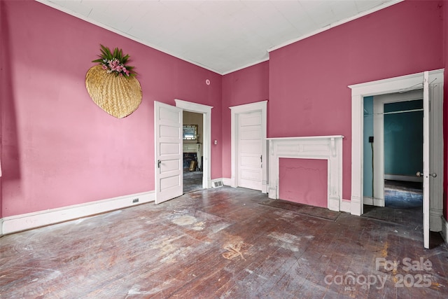 108 Walker St, Chester, SC 29706 - unfurnished living room featuring a fireplace, hardwood / wood-style floors, and ornamental molding
