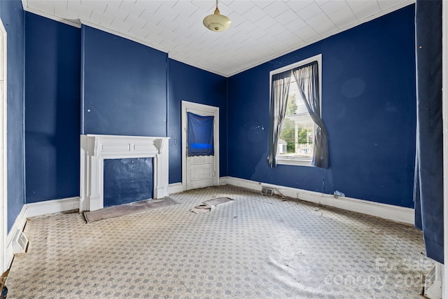108 Walker St, Chester, SC 29706 - unfurnished living room featuring carpet floors, a fireplace, and crown molding