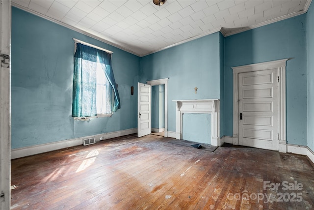 108 Walker St, Chester, SC 29706 - unfurnished living room featuring crown molding and hardwood / wood-style floors
