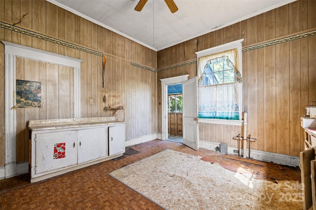 108 Walker St, Chester, SC 29706 - foyer entrance with wood walls, a ceiling fan, and ornamental molding