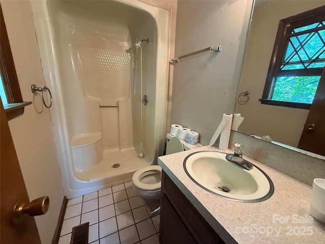 5422 River Rd, Granite Falls, NC 28630 - bathroom with a shower stall, tile patterned flooring, and vanity