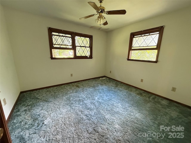 5422 River Rd, Granite Falls, NC 28630 - carpeted empty room featuring healthy amount of natural light and a ceiling fan