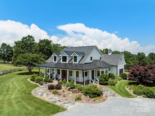 724 Moore Rd, Tryon, NC 28782 - view of front of house featuring a porch, a standing seam roof, a metal roof, driveway, and a shingled roof