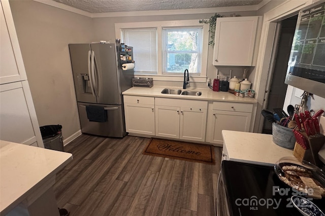 407 W Finger St, Maiden, NC 28650 - kitchen with stainless steel fridge, a textured ceiling, white cabinetry, light countertops, and ornamental molding