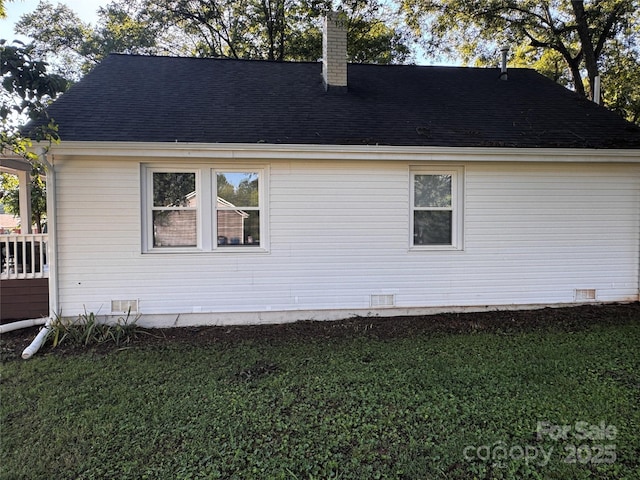 407 W Finger St, Maiden, NC 28650 - view of home's exterior with a yard, a chimney, and a shingled roof
