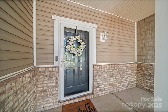 10420 Glenburn Ln, Charlotte, NC 28278 - doorway to property with brick siding