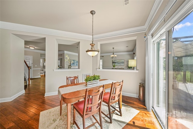 10420 Glenburn Ln, Charlotte, NC 28278 - dining room featuring crown molding, hardwood / wood-style floors, and stairs