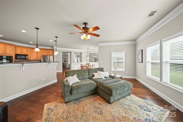 10420 Glenburn Ln, Charlotte, NC 28278 - living area featuring crown molding, a ceiling fan, dark wood-style floors, and recessed lighting