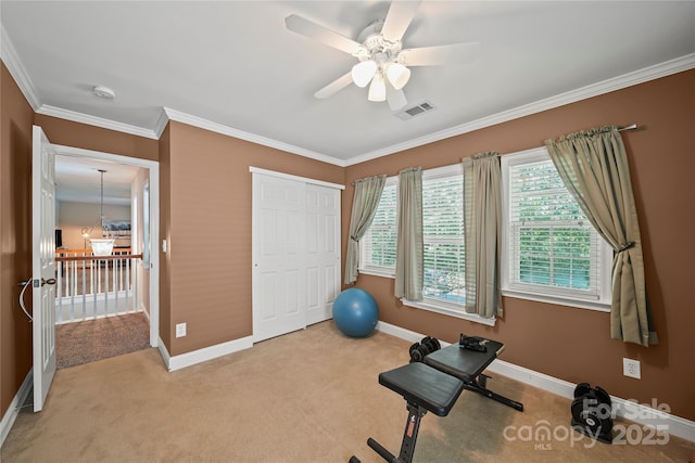 10420 Glenburn Ln, Charlotte, NC 28278 - exercise room featuring light colored carpet, crown molding, a ceiling fan, and healthy amount of natural light