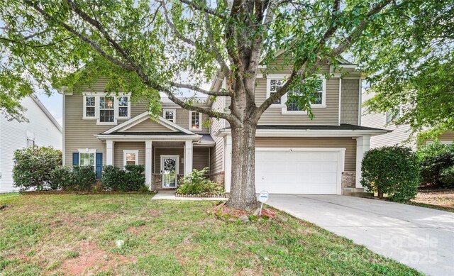 10420 Glenburn Ln, Charlotte, NC 28278 - view of front of property with a garage, concrete driveway, a front yard, and brick siding