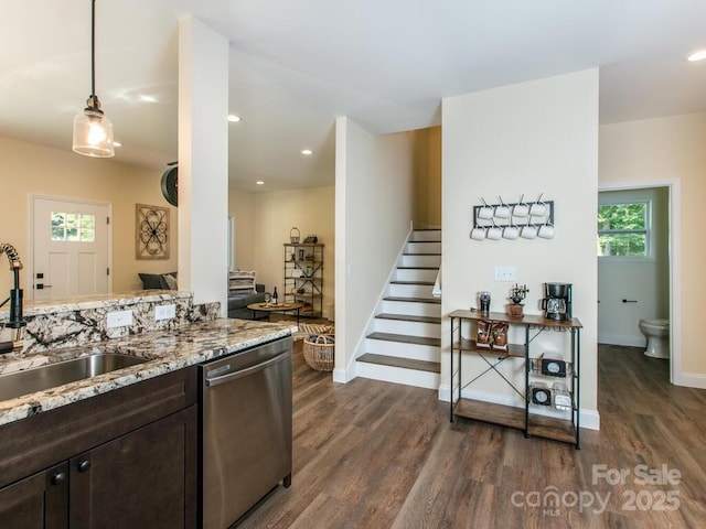 508 S Oconeechee Ave Unit 1, Black Mountain, NC 28711 - kitchen with dishwasher, dark wood-style flooring, dark brown cabinets, light stone countertops, and recessed lighting