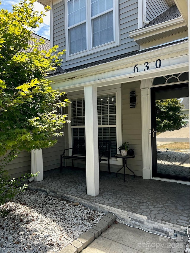 630 Springhouse Pl, Clover, SC 29710 - doorway to property with a porch and a shingled roof