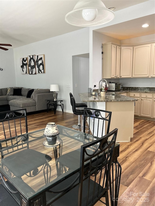630 Springhouse Pl, Clover, SC 29710 - dining area with light wood-style floors and a ceiling fan