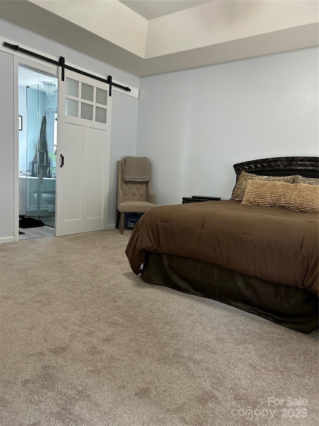 630 Springhouse Pl, Clover, SC 29710 - carpeted bedroom featuring a barn door and ensuite bath