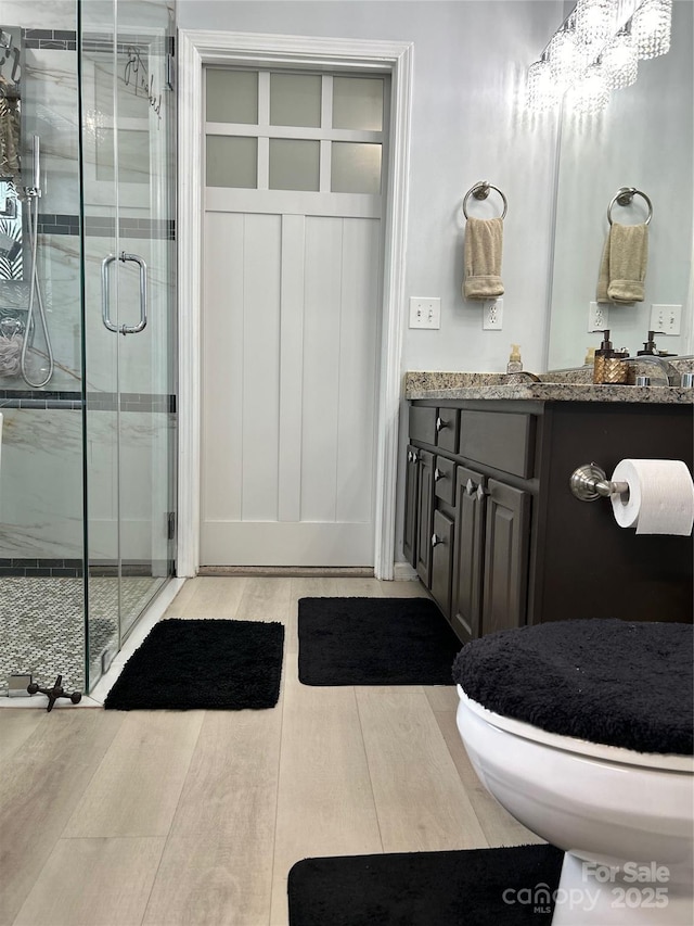 630 Springhouse Pl, Clover, SC 29710 - full bath with a stall shower, vanity, and wood finished floors
