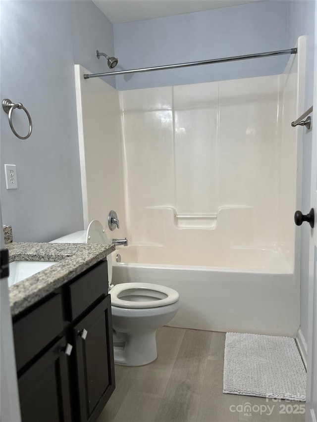 630 Springhouse Pl, Clover, SC 29710 - bathroom featuring vanity, tub / shower combination, and wood finished floors