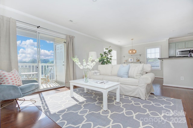 1075 Triece Ln, Charlotte, NC 28215 - living room featuring wood finished floors and ornamental molding