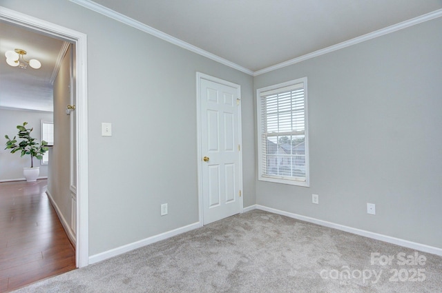 1075 Triece Ln, Charlotte, NC 28215 - unfurnished bedroom featuring ornamental molding and carpet floors