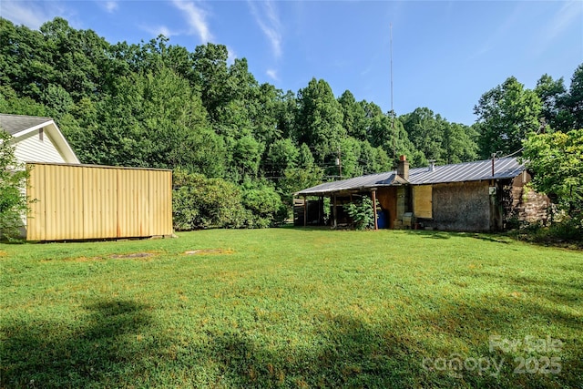 4720 Brevard Rd, Horse Shoe, NC 28742 - view of green lawn featuring a wooded view