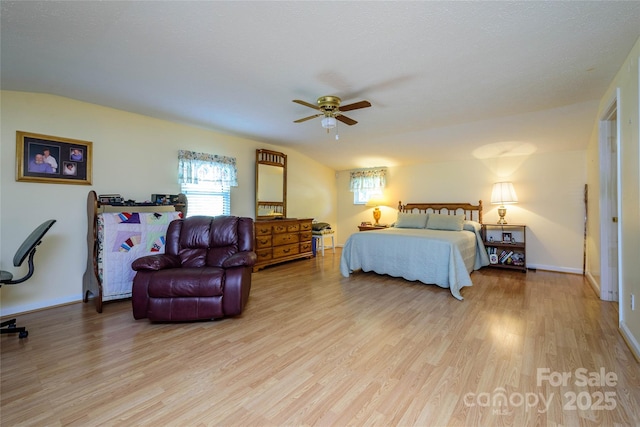 4720 Brevard Rd, Horse Shoe, NC 28742 - bedroom featuring light wood-style flooring and ceiling fan