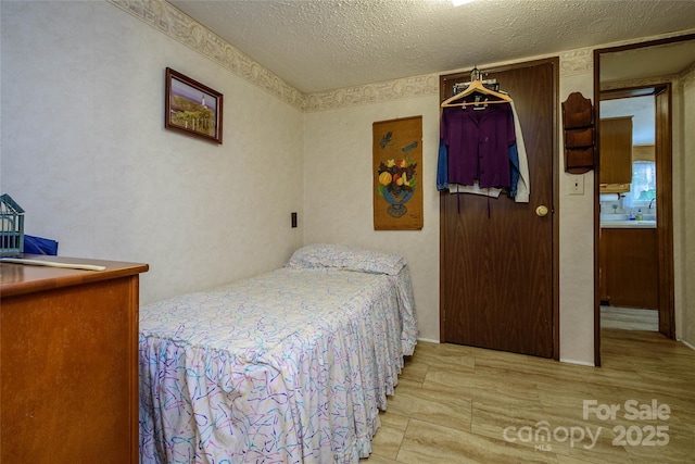 4720 Brevard Rd, Horse Shoe, NC 28742 - bedroom with a textured ceiling
