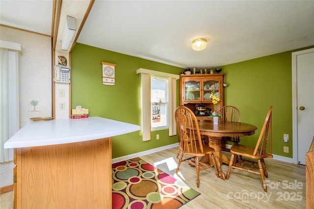 4720 Brevard Rd, Horse Shoe, NC 28742 - dining room with light wood-type flooring and baseboards