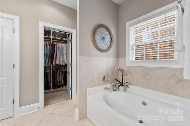 9012 Arrington Manor Pl, Charlotte, NC 28277 - bathroom with a bath, tile patterned flooring, and a spacious closet