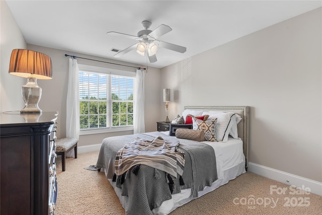 9012 Arrington Manor Pl, Charlotte, NC 28277 - bedroom featuring light carpet and a ceiling fan