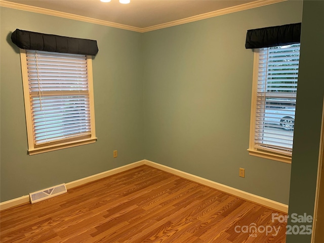 470 Roger Dr, Salisbury, NC 28147 - spare room with wood finished floors and crown molding