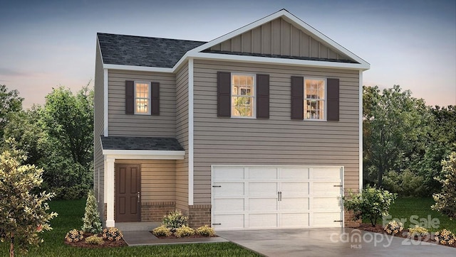 1053 20th Avenue Loop SE, Hickory, NC 28602 - view of front of house with board and batten siding, concrete driveway, roof with shingles, and a garage
