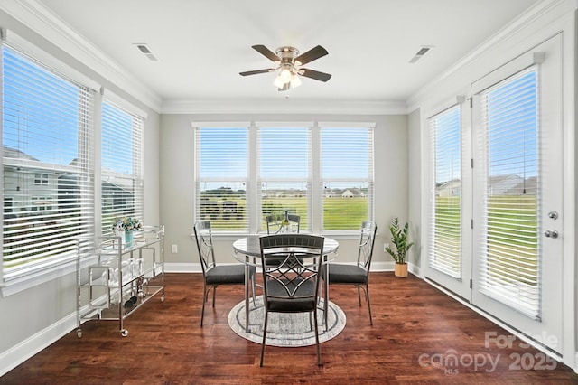 2006 Paddington Dr, Indian Trail, NC 28079 - dining area featuring plenty of natural light, crown molding, a ceiling fan, and wood finished floors