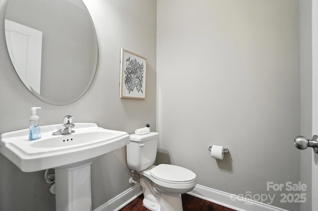 2006 Paddington Dr, Indian Trail, NC 28079 - half bath featuring baseboards and wood finished floors