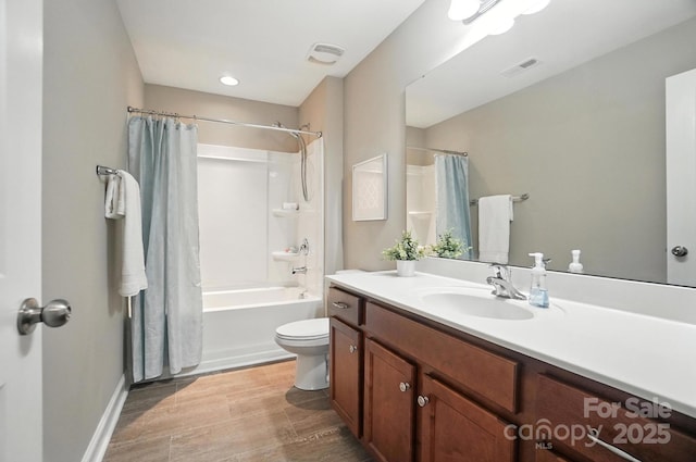 2006 Paddington Dr, Indian Trail, NC 28079 - full bath featuring vanity, shower / bathtub combination with curtain, and wood finished floors