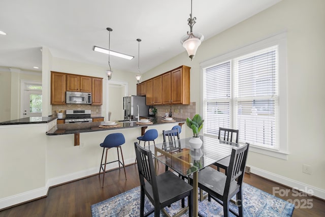 1855 Second Baxter Xing, Fort Mill, SC 29708 - dining space with plenty of natural light and dark wood-style floors