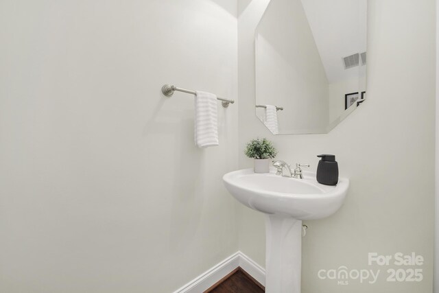 1855 Second Baxter Xing, Fort Mill, SC 29708 - bathroom with baseboards and lofted ceiling