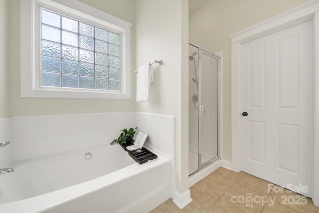 1855 Second Baxter Xing, Fort Mill, SC 29708 - bathroom featuring a bath, tile patterned flooring, and a stall shower