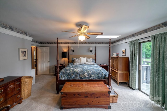 7411 Davis Rd, Waxhaw, NC 28173 - bedroom with light colored carpet, a skylight, access to exterior, and ceiling fan