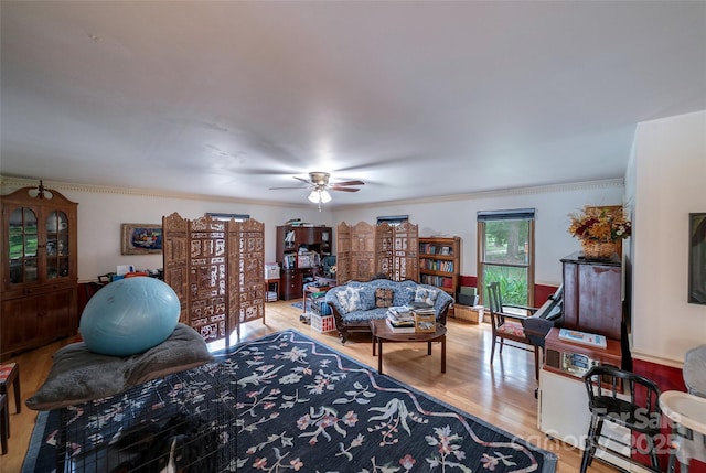 7411 Davis Rd, Waxhaw, NC 28173 - living room featuring wood finished floors, a ceiling fan, and ornamental molding