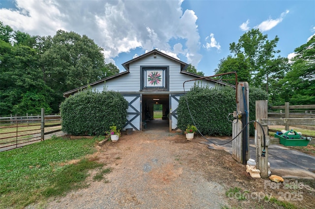 7411 Davis Rd, Waxhaw, NC 28173 - view of front facade featuring an outdoor structure and a barn