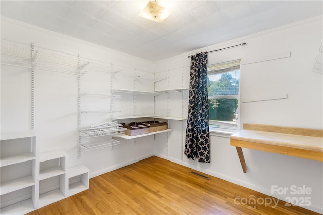 735 Edmiston Rd, Mount Ulla, NC 28125 - spacious closet featuring light wood-style floors