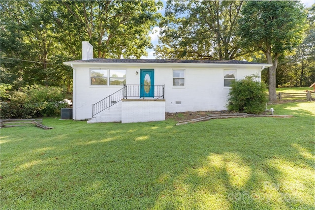 735 Edmiston Rd, Mount Ulla, NC 28125 - view of front of home with a chimney and a front yard