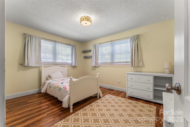 4 Northview Ln, Weaverville, NC 28787 - bedroom featuring wood finished floors and a textured ceiling