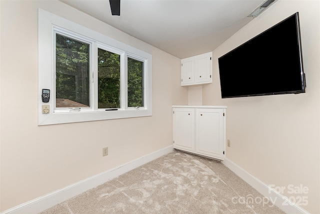5 Hidden Cove Ln, Clover, SC 29710 - empty room with light colored carpet and a ceiling fan