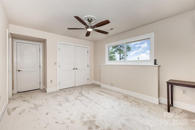 5 Hidden Cove Ln, Clover, SC 29710 - unfurnished bedroom with carpet, a ceiling fan, and a closet