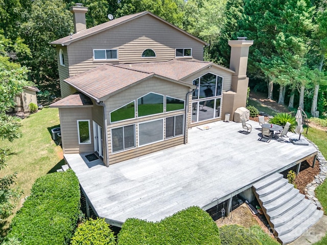 5 Hidden Cove Ln, Clover, SC 29710 - back of house featuring a chimney, a wooden deck, and a yard