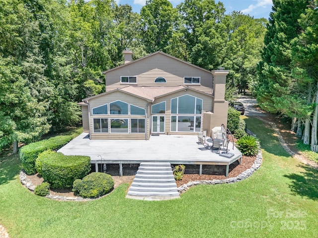 5 Hidden Cove Ln, Clover, SC 29710 - rear view of property featuring a chimney, a wooden deck, and a yard